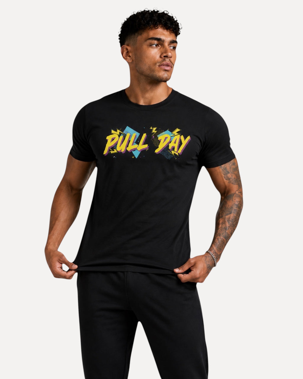 My Store ATHLEX black cotton gym t-shirt with colorful Pull Day graphic print worn by a muscular man