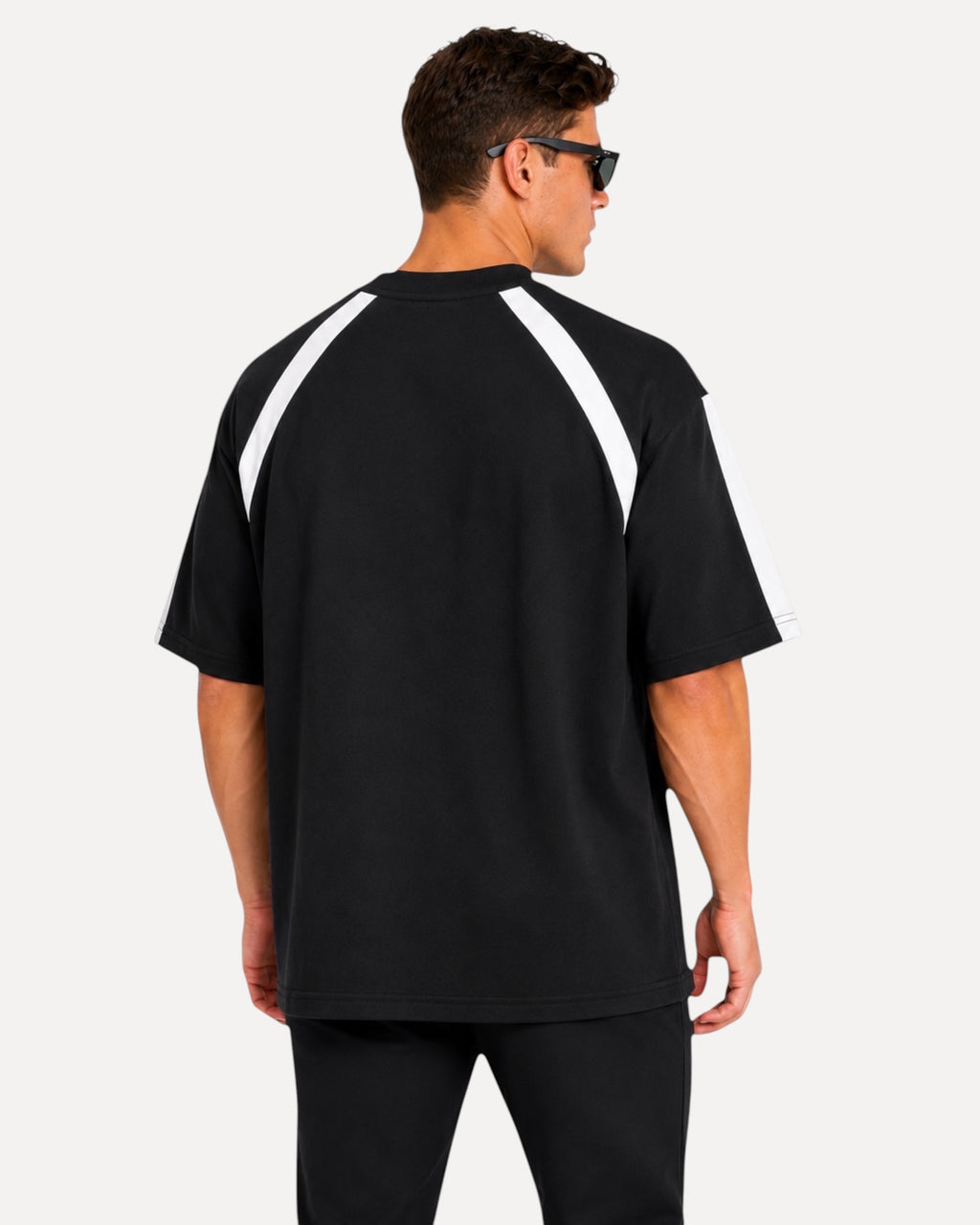 My Store ATHLEX men's black oversized performance t-shirt with white shoulder panels, viewed from the back