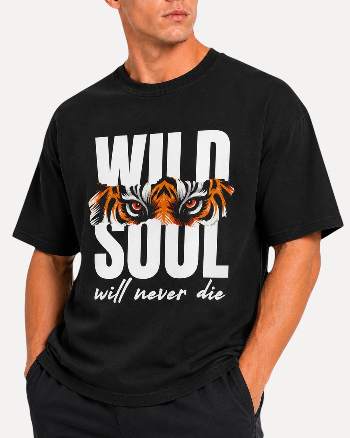 My Store ATHLEX black oversized graphic tee featuring a tiger eye print and Wild Soul text on a male model
