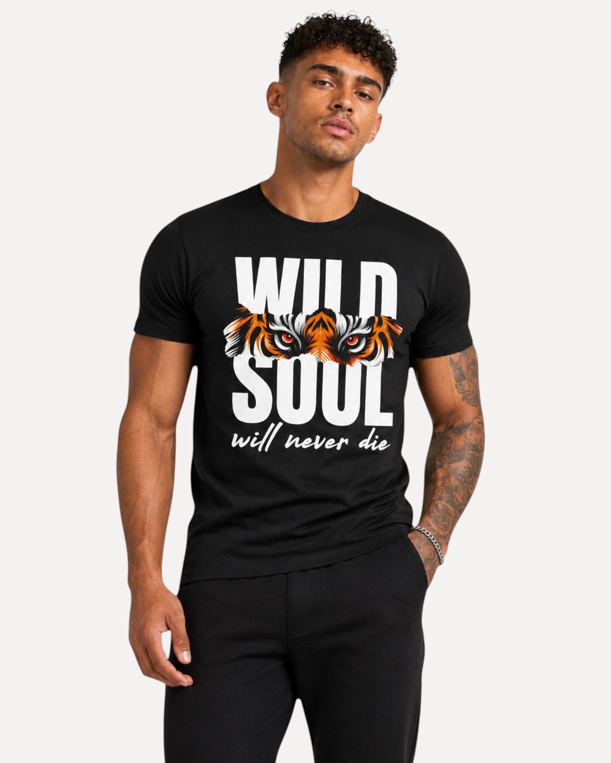 My Store ATHLEX black cotton graphic tee featuring a tiger eye design and Wild Soul text worn by a muscular man
