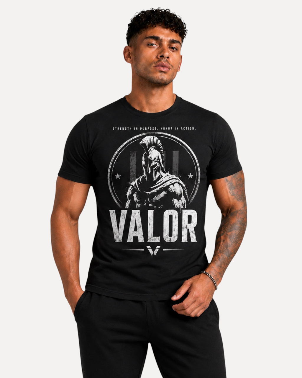 My Store ATHLEX black cotton jersey graphic tee featuring a bold warrior helmet design and VALOR text on a male model