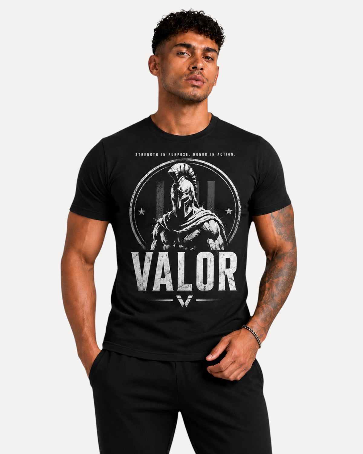 My Store ATHLEX black cotton jersey graphic tee featuring a bold warrior helmet design and VALOR text on a male model