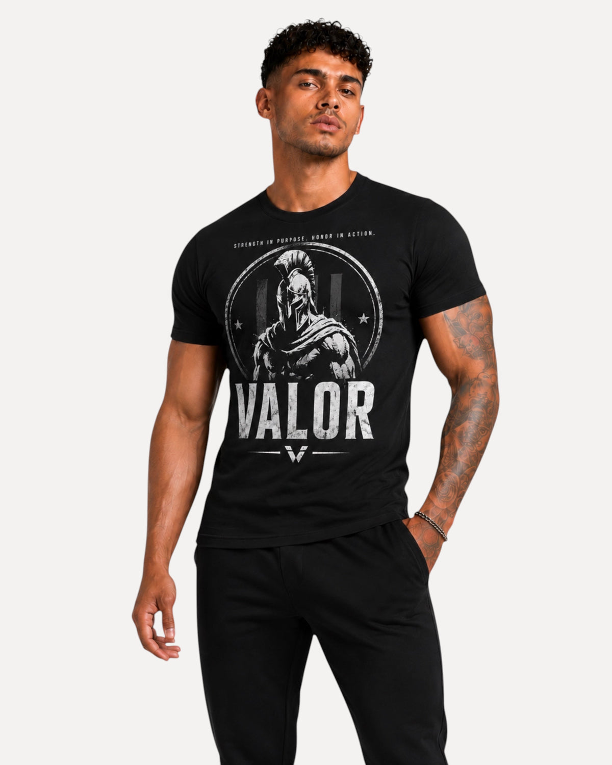 My Store ATHLEX black cotton graphic tee featuring a white warrior helmet design and VALOR text on a male model