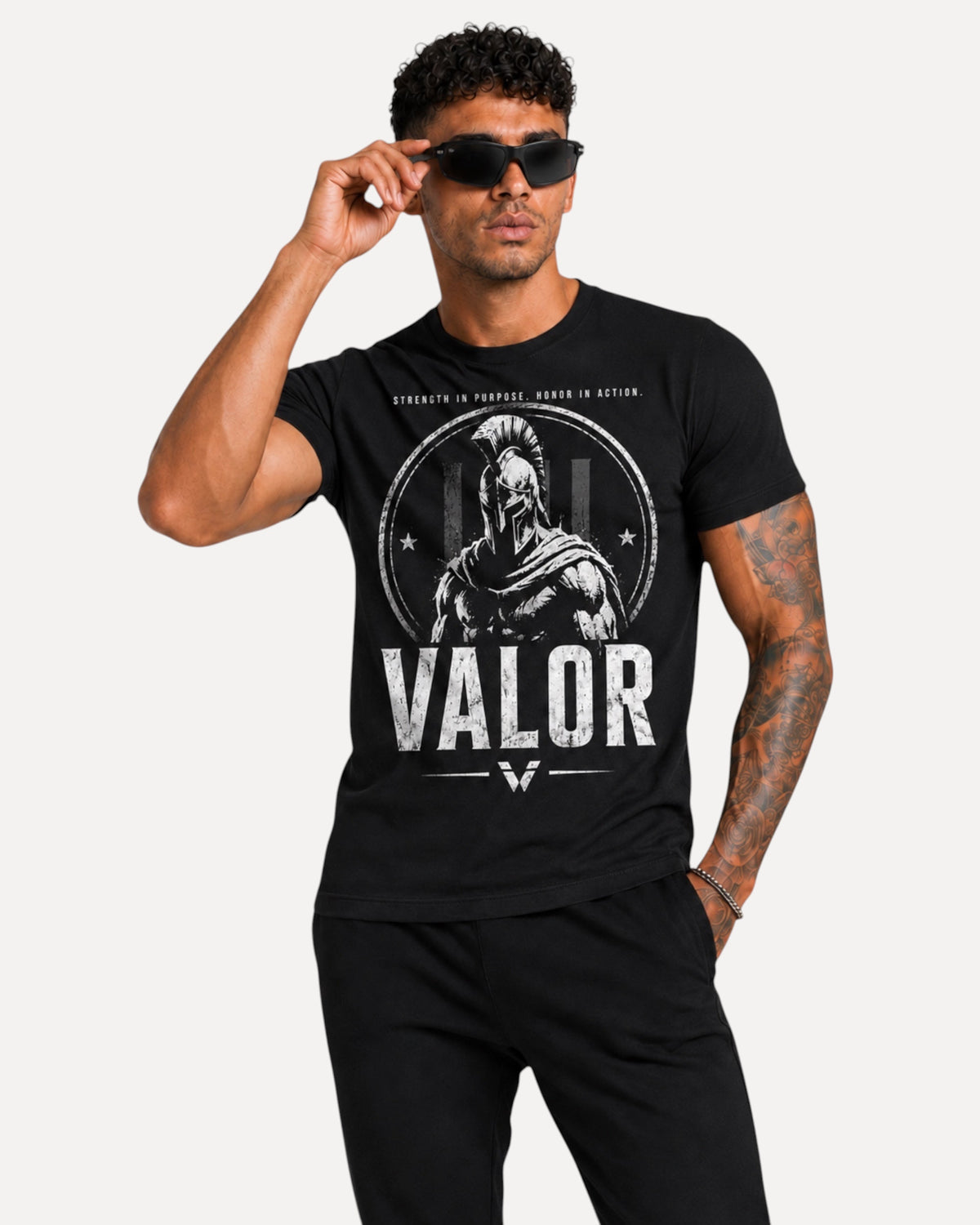 My Store ATHLEX black cotton graphic tee featuring a warrior design and VALOR text worn by a man in sunglasses