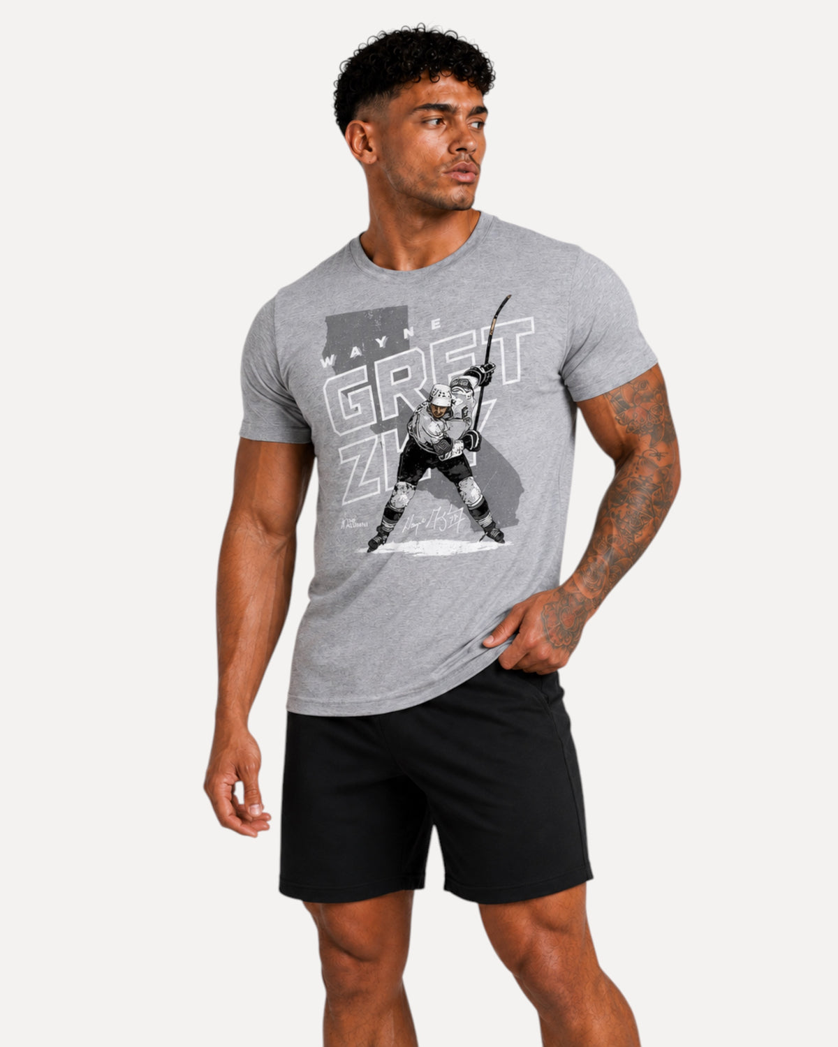 My Store ATHLEX Ice Legend grey cotton graphic t-shirt featuring a hockey player print worn by a male model