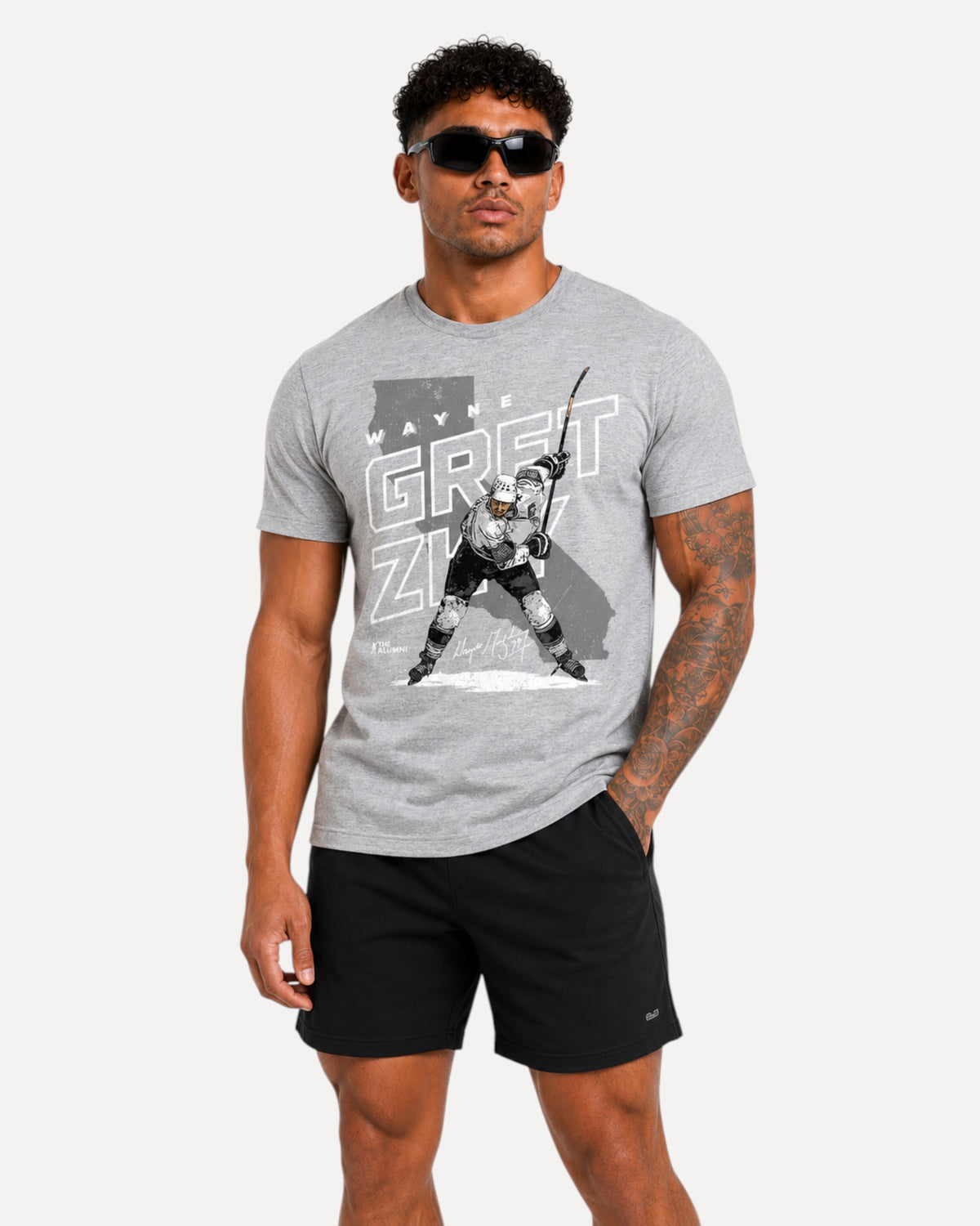 My Store ATHLEX Ice Legend grey cotton crew-neck t-shirt with hockey graphic worn by a man in black shorts