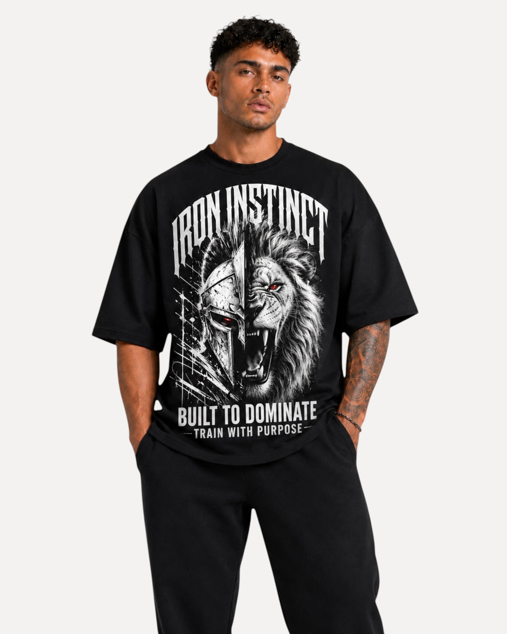 My Store Athlex Iron Instinct oversized black graphic t-shirt with lion and warrior helmet print on a male model
