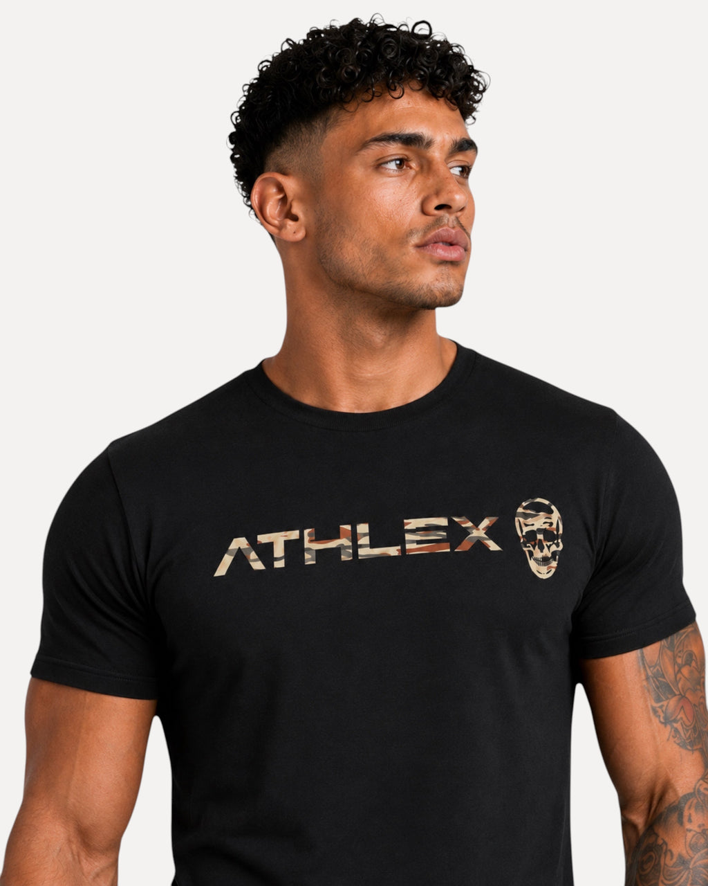 My Store ATHLEX Phantom Skull black cotton crew neck t-shirt with camo logo worn by a man